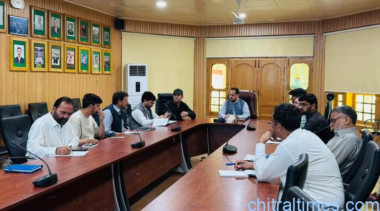 chitraltimes dc lower maqbool hussain chairing road projects 1