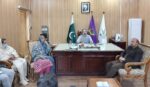 chitraltimes dc upper chitral chairing ngos meeting 2
