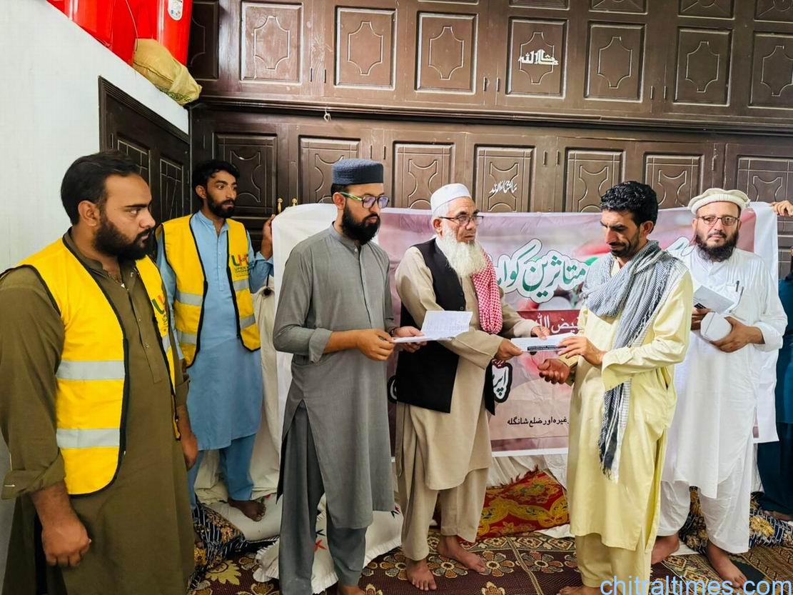 chitraltimes qari faizullah flood affected buner visits 2